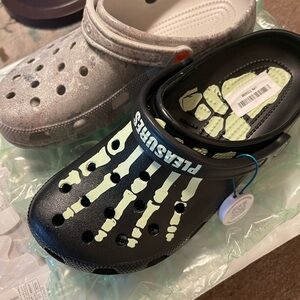 Men’s size 10 crocs, one staple pigeon one pleasures. Yes it glows.